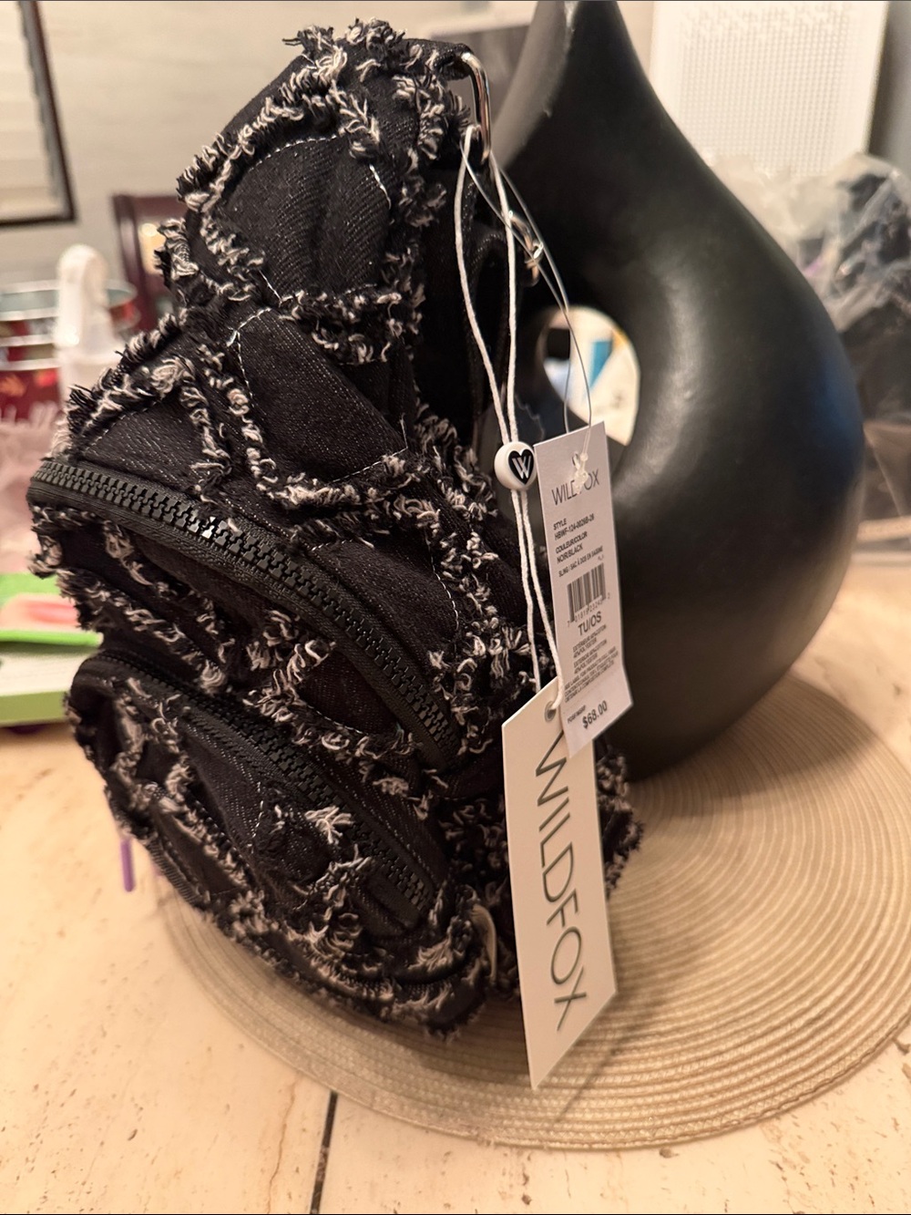 Wildfox Black Sling Backpack with White Frayed Denim and Lavender Zipper Tips
